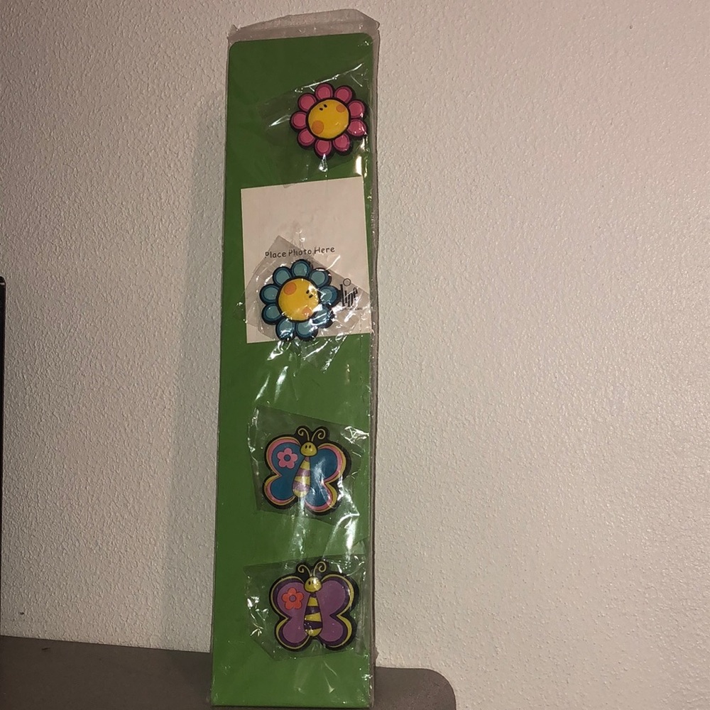 Magnet board with flower & butterfly magnets.